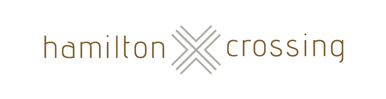 A green background with the words "hamilton crossing" in orange.