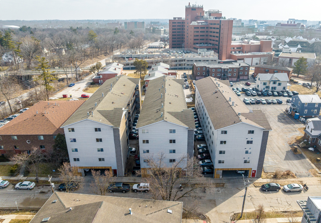 an aerial view of houses and buildings in a city