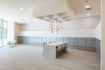 a large room with a long table and chairs in it