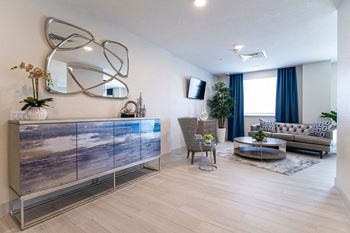 a living room with a couch and a tv