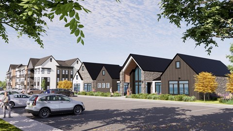 A modern house with a grey car parked in front.
