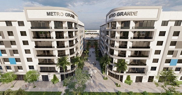 a rendering of two buildings with palm trees and a road between them