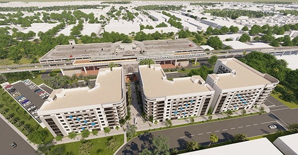 an aerial view of a city with buildings and trees