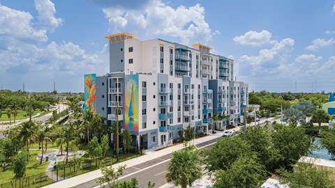 a large building with colorful painting on the side of it