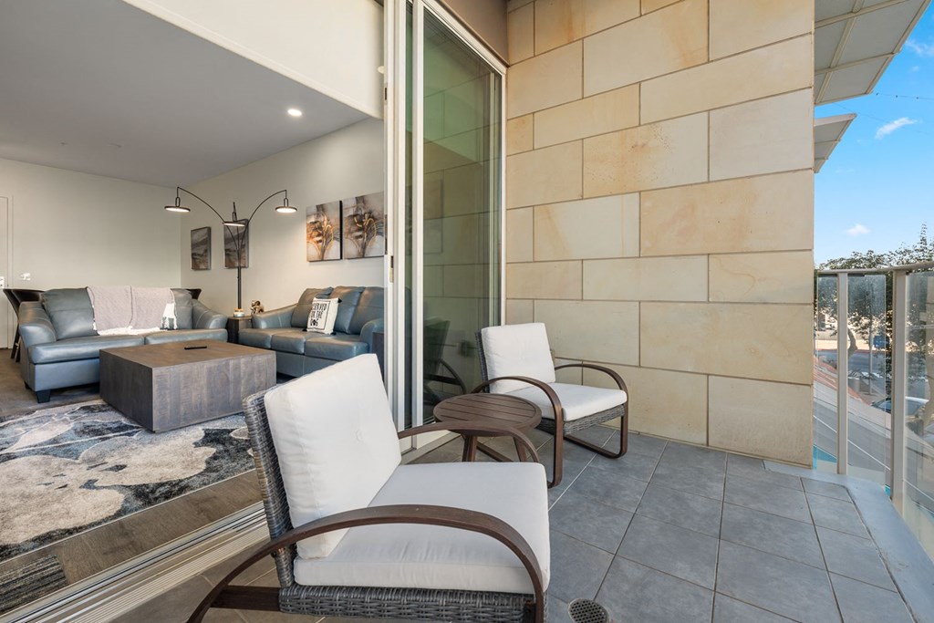 a living room with a couch and a table