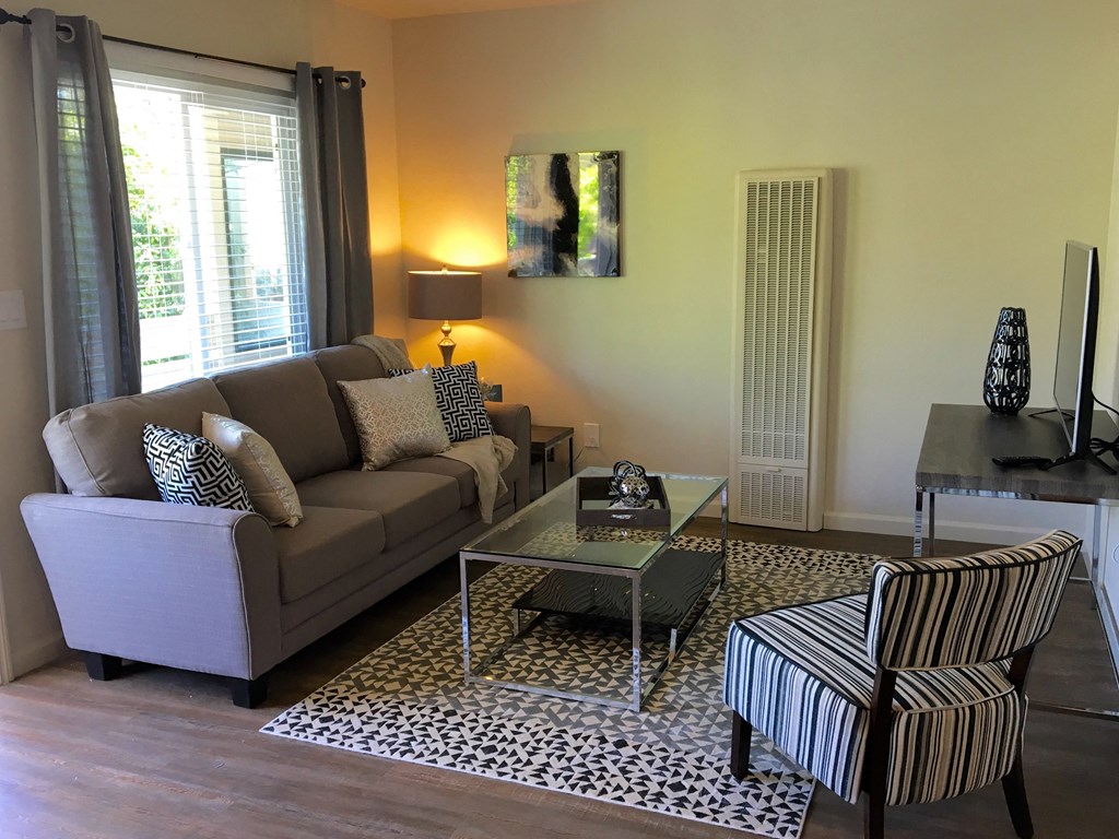 a living room with a couch and a coffee table