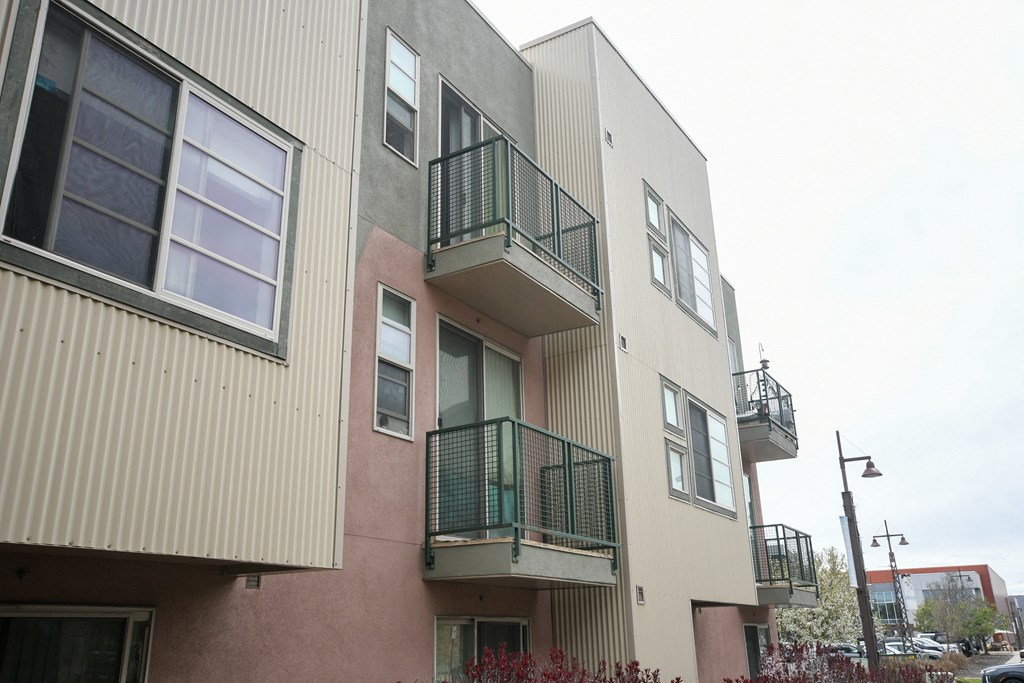an image of an apartment building with balconies