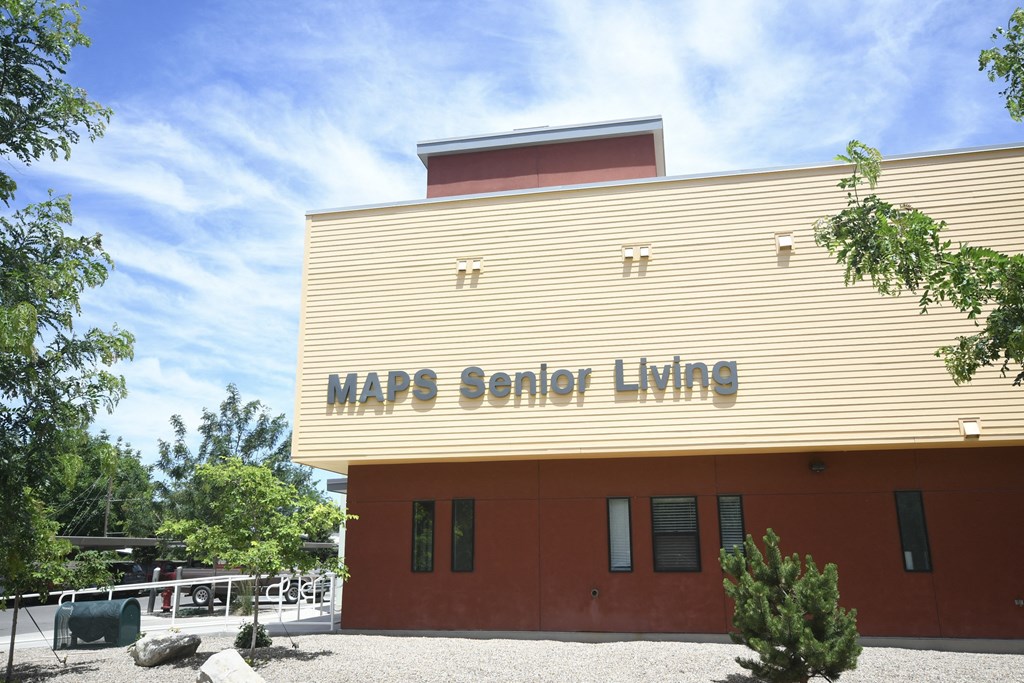 a building with a sign on it that reads war soldier living