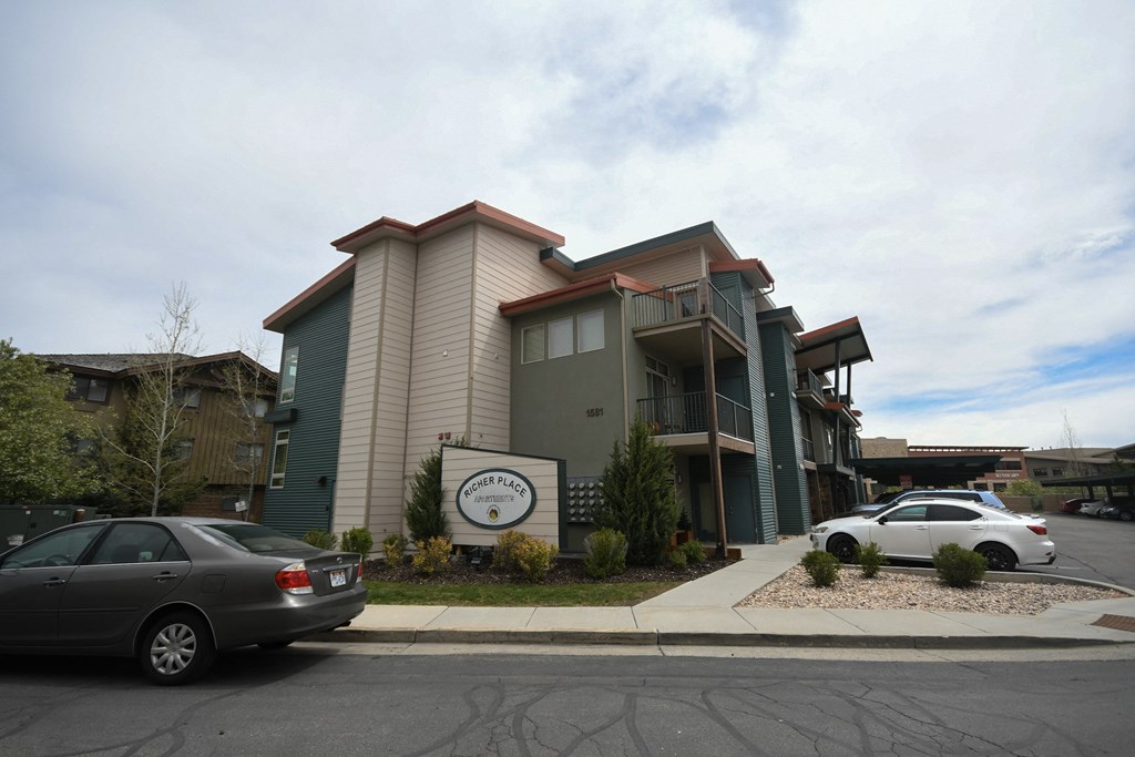 a building with a car parked in front of it