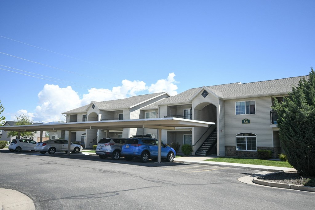 a building with cars parked in front of it