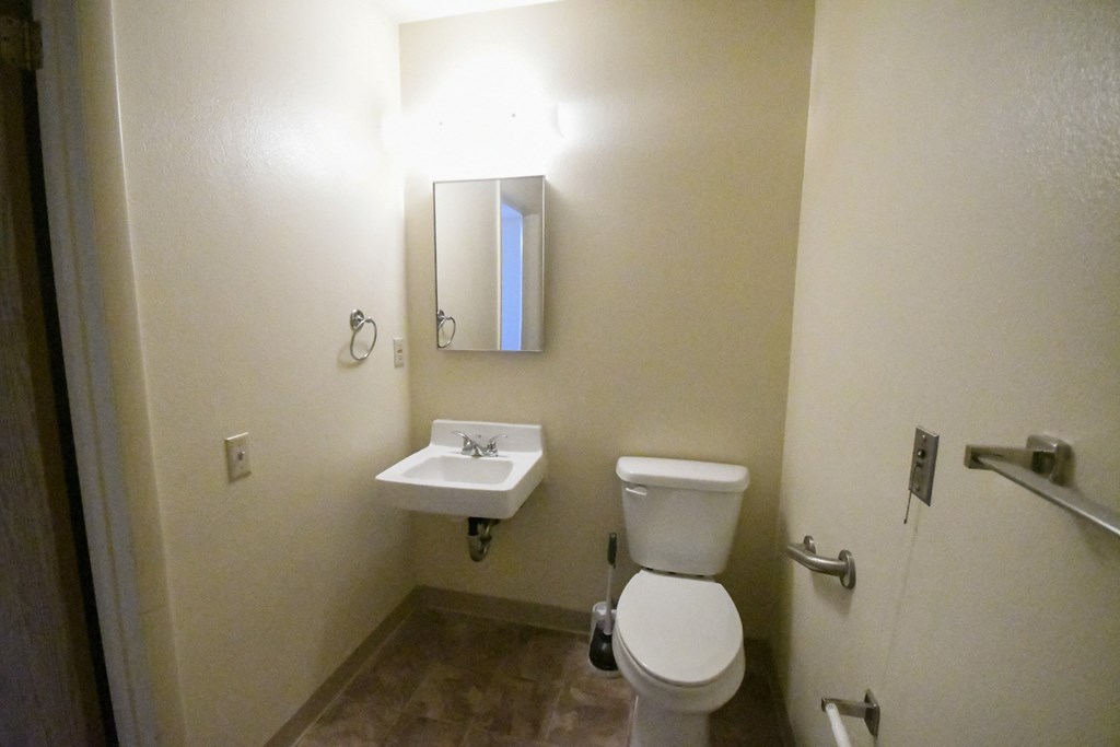 a small bathroom with a toilet and a sink