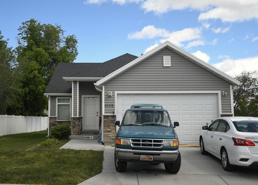 a car parked in front of a house