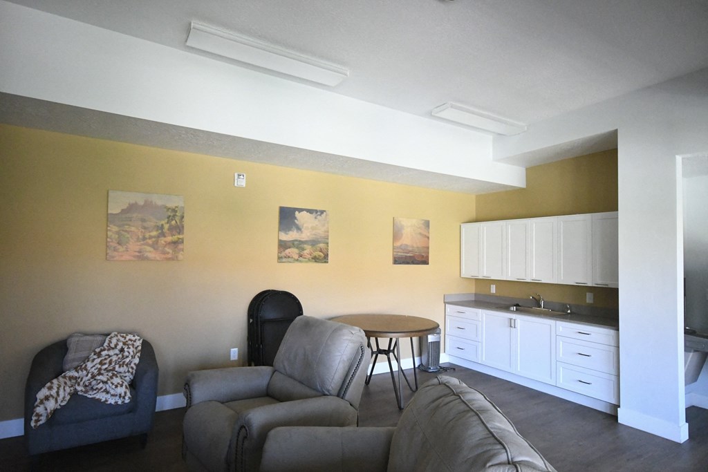 a living room with a couch and a table