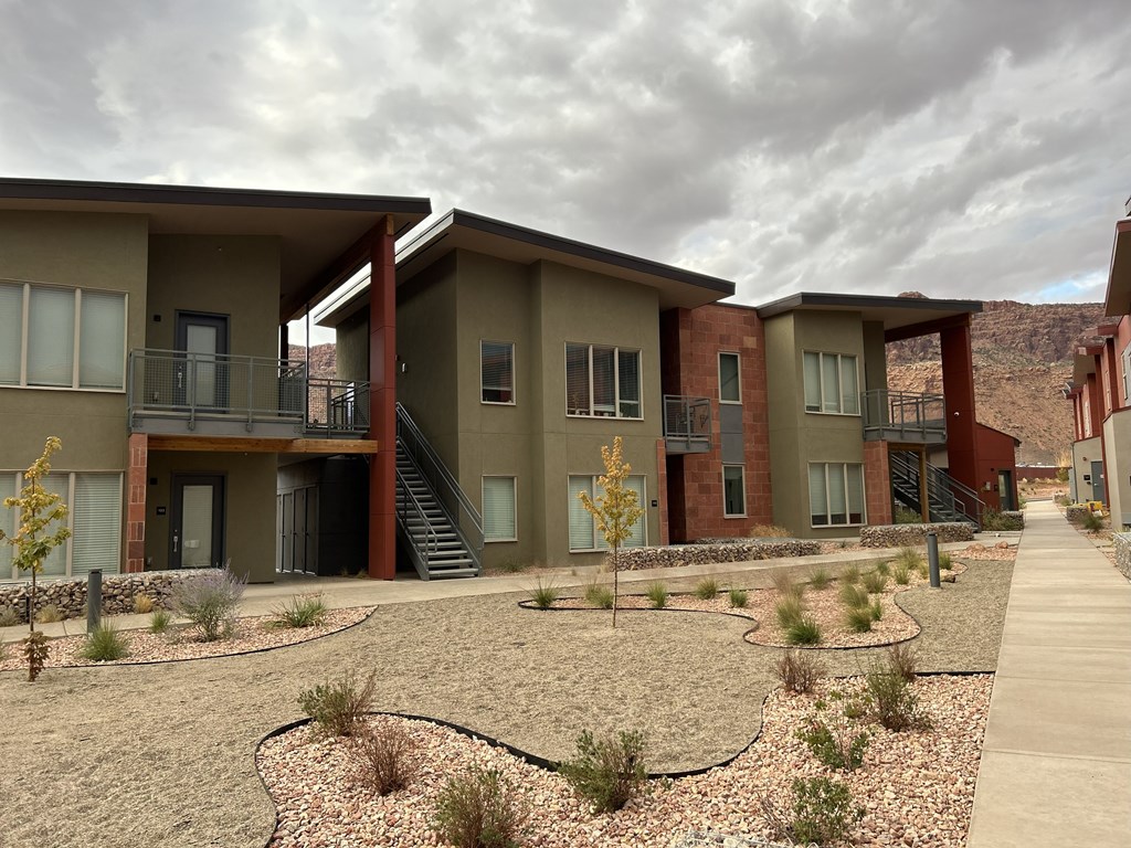 Buildings with landscaping.