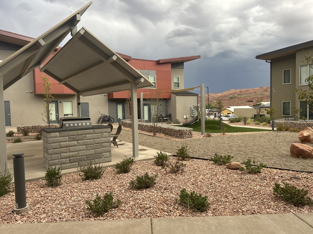 BBQ area with landscaping.