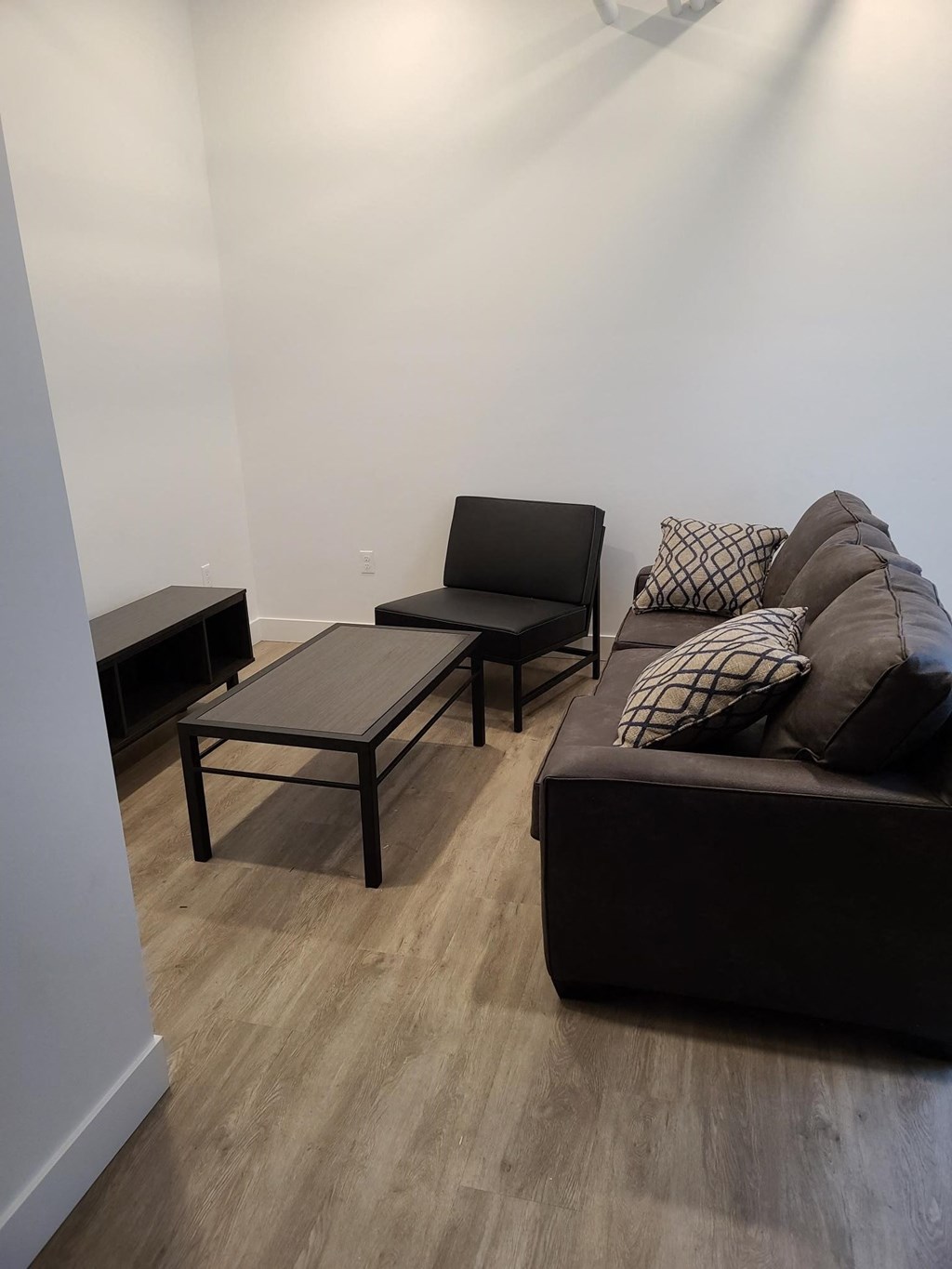 a living room with a couch and a coffee table