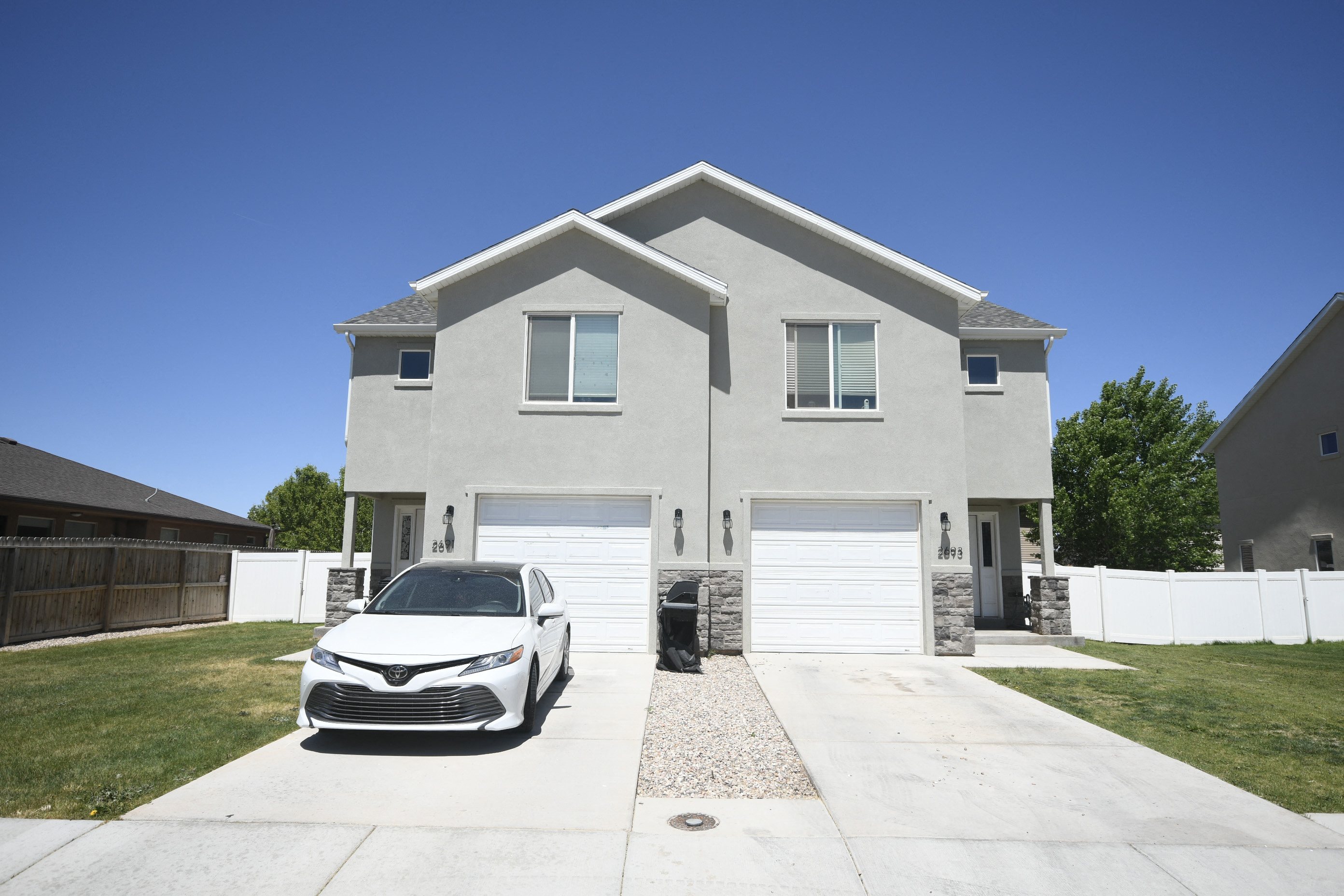 a car parked in front of a house