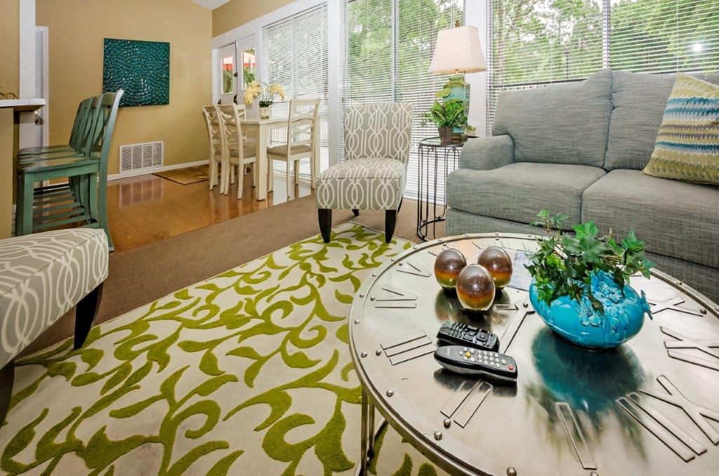 a living room with a couch and a table