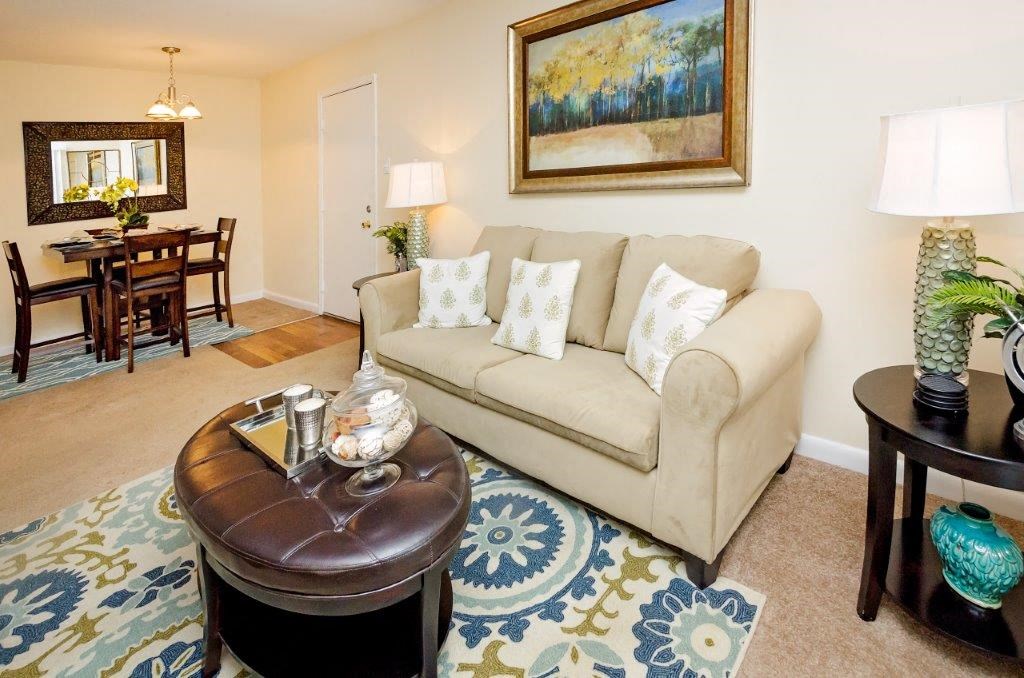 a living room with a couch and a coffee table