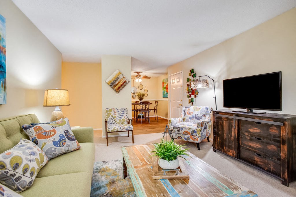 a living room with a couch and a television