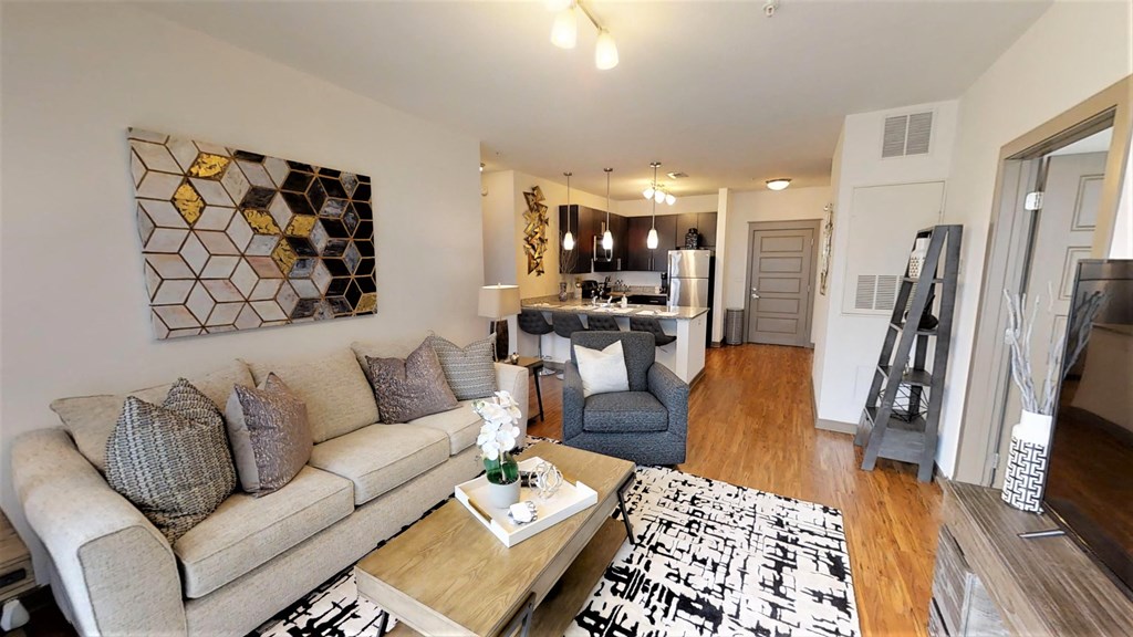 a living room with a couch and a table