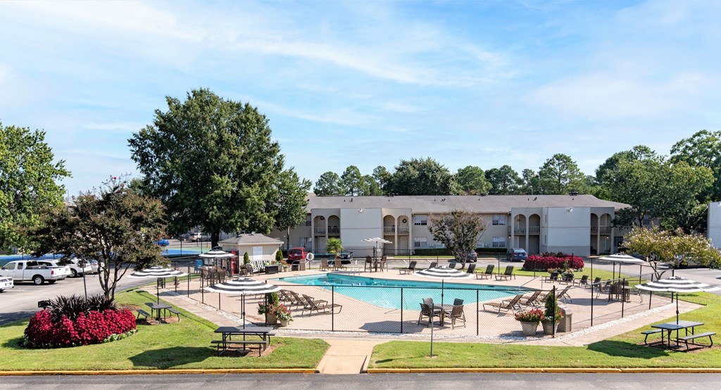 a view of a swimming pool with a building in the background