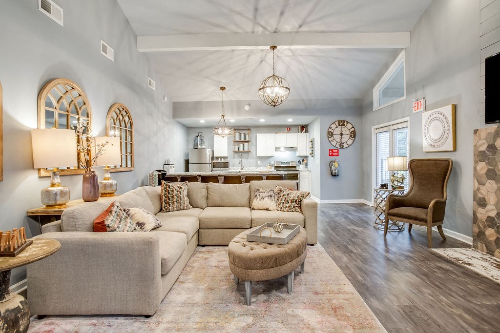a living room with a couch and a table