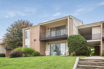 Clubhouse at Falcon Creek Apartment homes Spacious, landscaped outdoor terrace with lush seating, grills and a fire pit - Photo Gallery 6