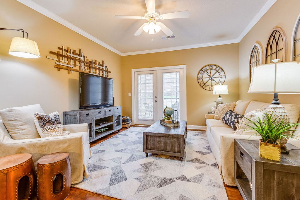 a living room with a couch and a television