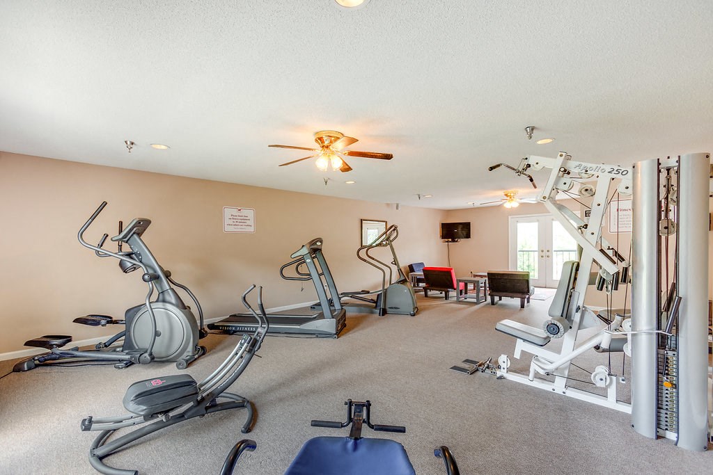 the gym at the 1861 soco apartments