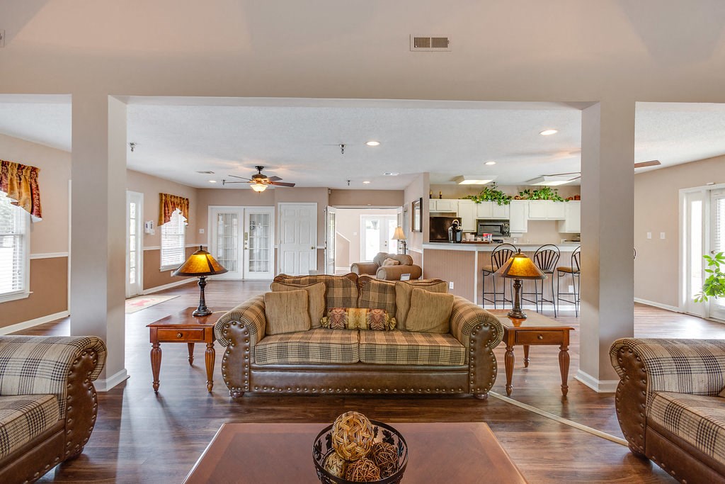 a living room with a couch and a table