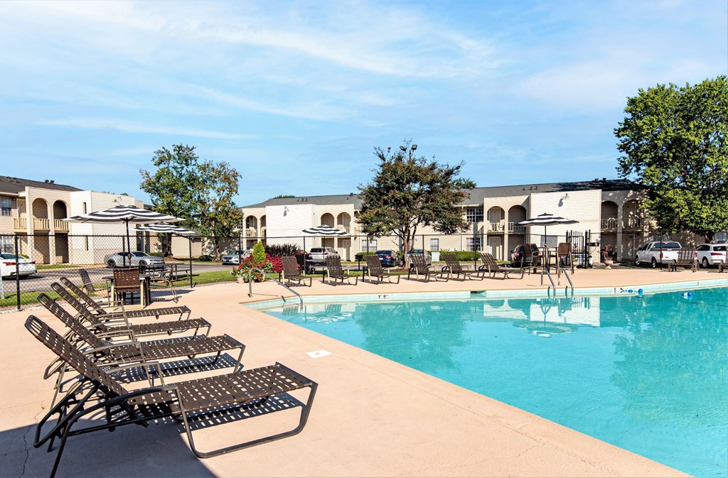 our apartments have a large swimming pool and lounge chairs
