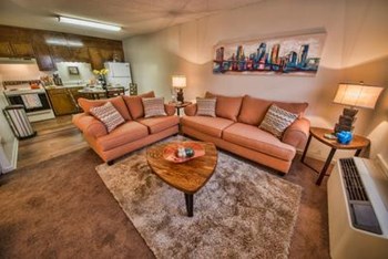 Executive Lodge Apartments Living room in Huntsville, AL - Photo Gallery 5