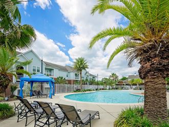 our apartments have a pool and lounge chairs