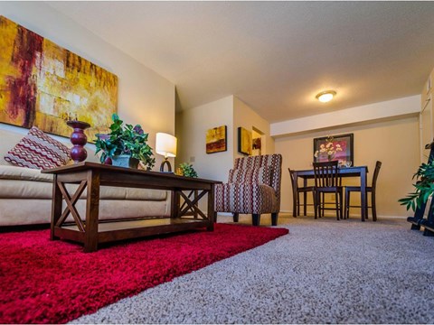 a living room with a couch and a table