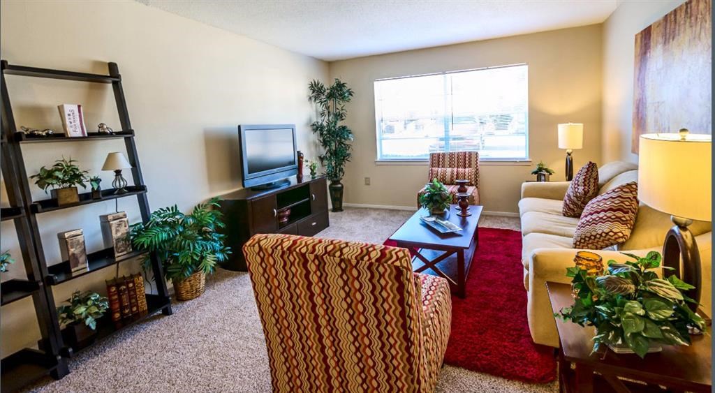 a living room with a couch and a television