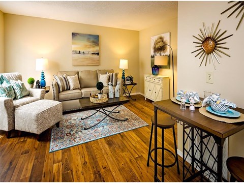 a living room with a couch and a table