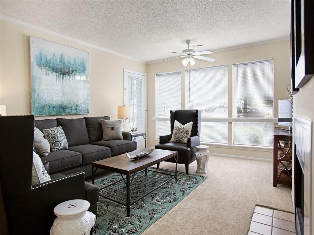 a living room with a couch and a table