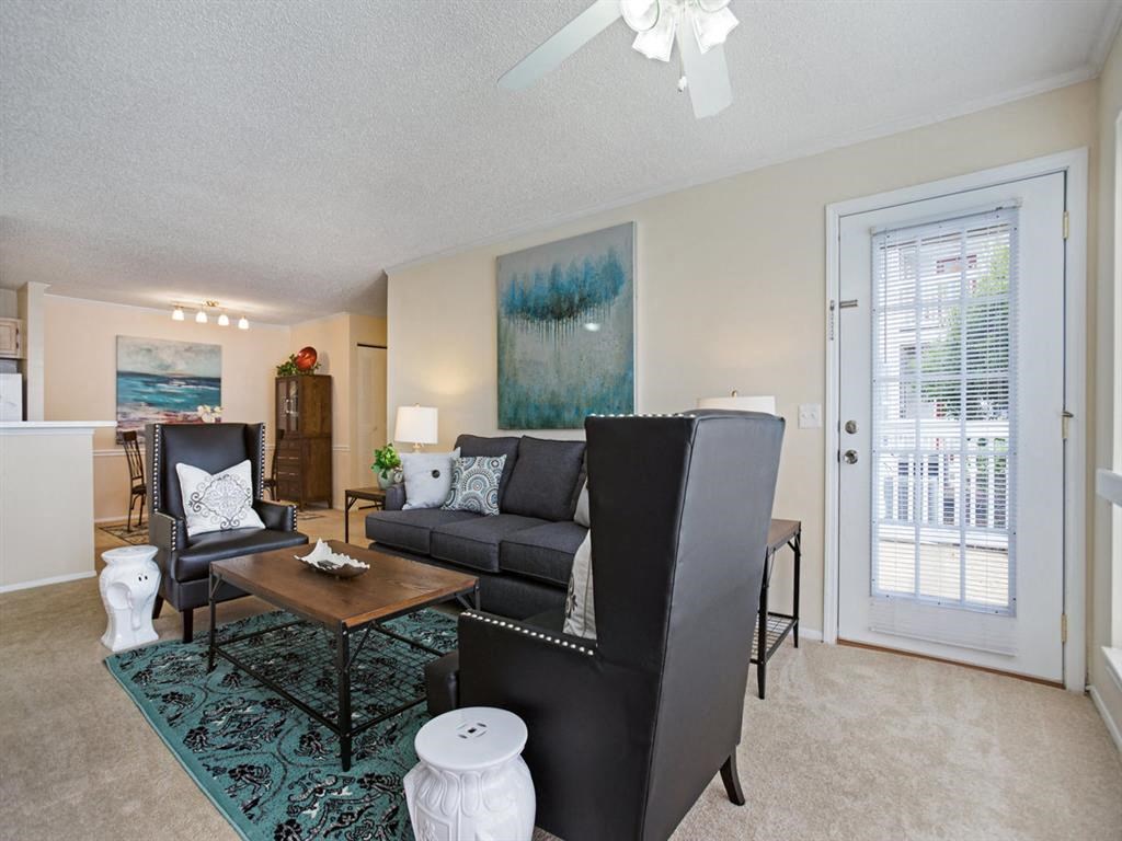 a living room with a couch and a table