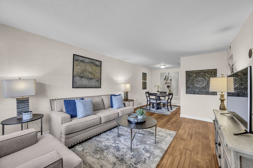 a living room with couches and a table