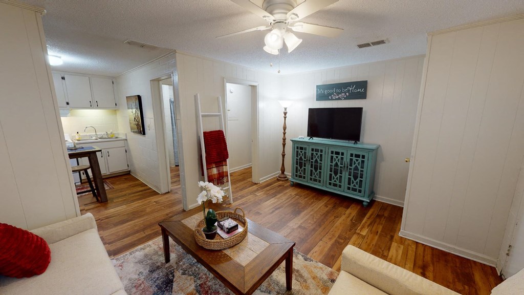 a living room with a couch and a table