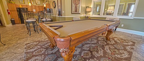 a pool table in a living room