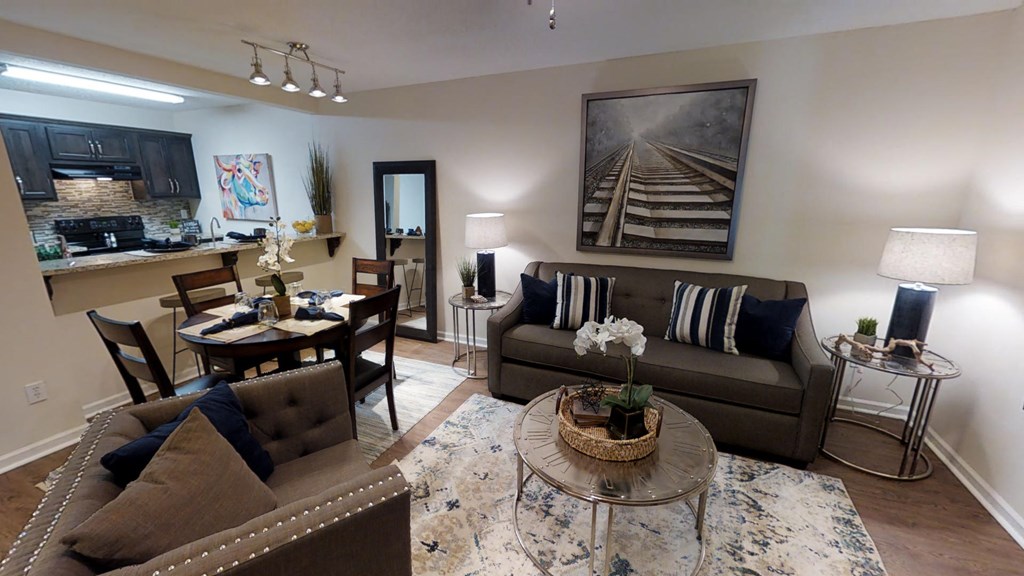 a living room with couches and a table