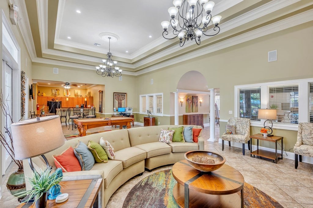 a living room with a couch and a table