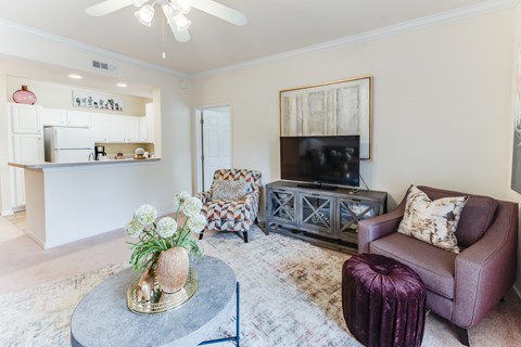 a living room with a couch and a table
