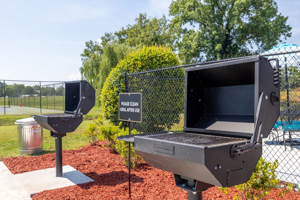 a grill and two urinals in a park with a cyber crime