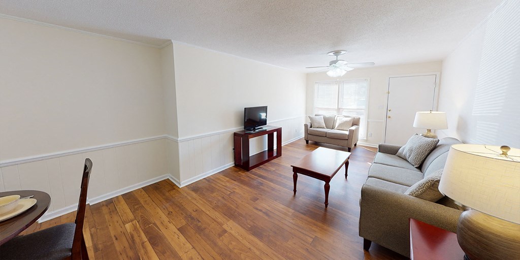 a living room with a couch and a table
