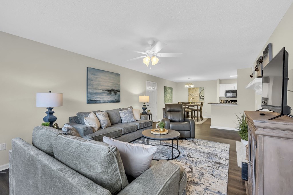 a living room with a couch and a tv