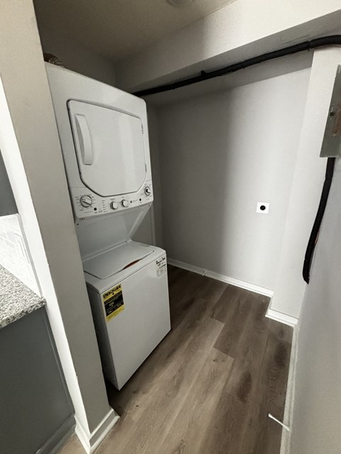a washer and dryer in a small room in a closet