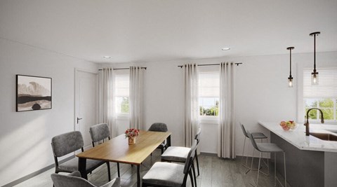 A modern dining room with a wooden table and grey chairs.